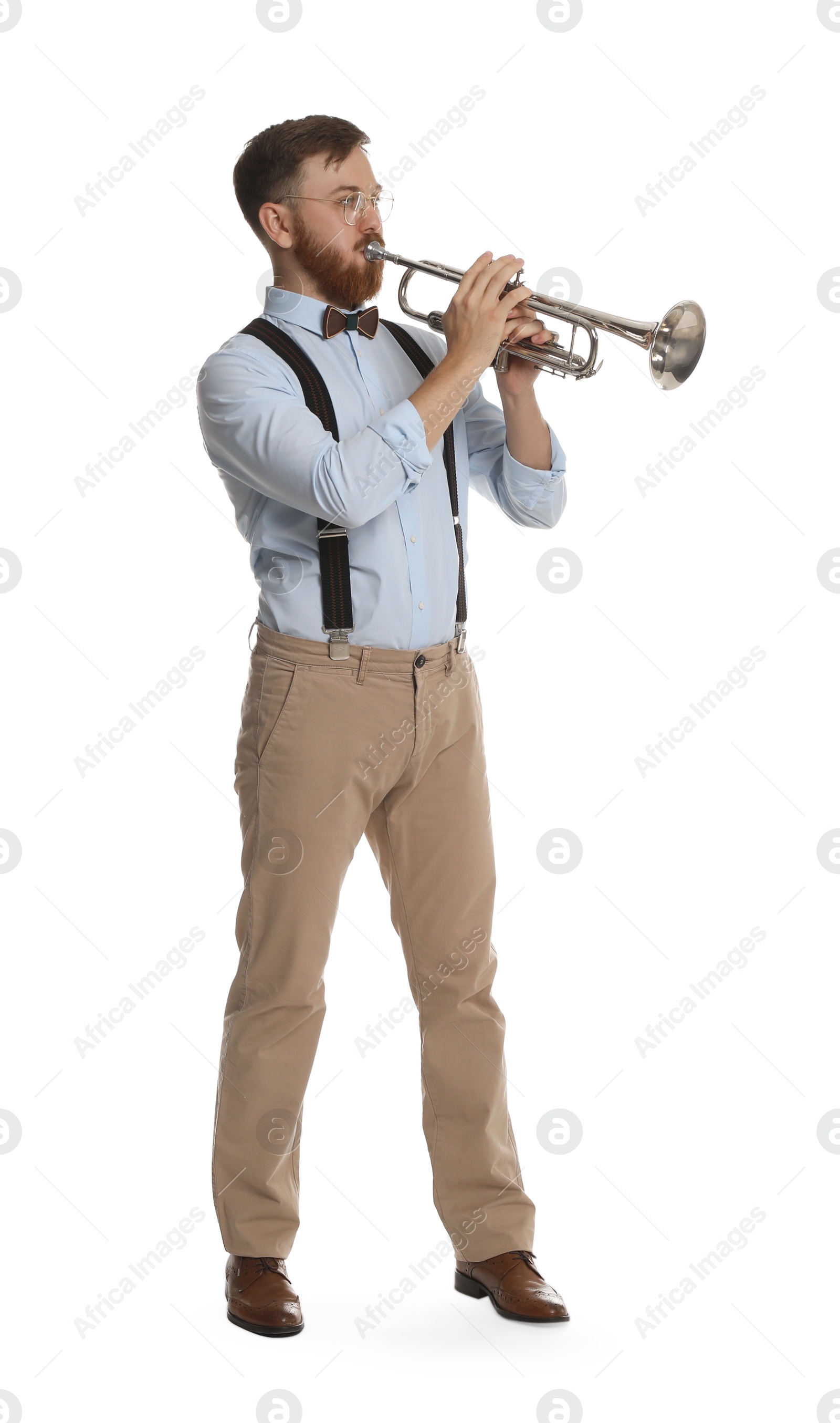 Photo of Handsome musician playing trumpet on white background