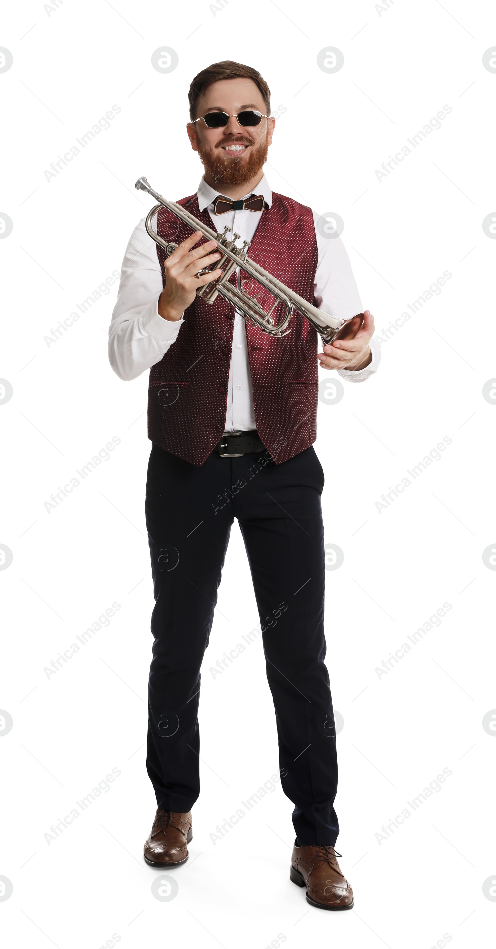 Photo of Smiling musician with trumpet on white background