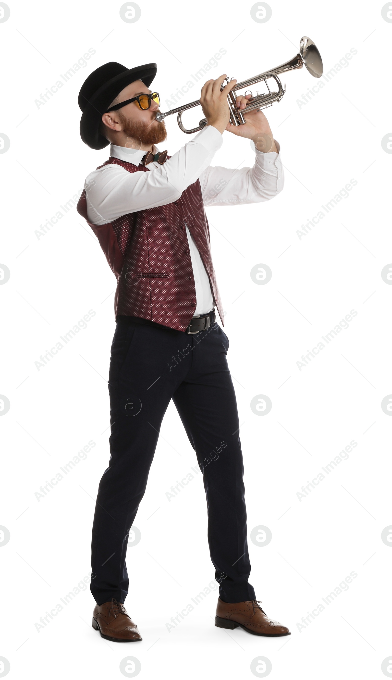 Photo of Handsome musician playing trumpet on white background