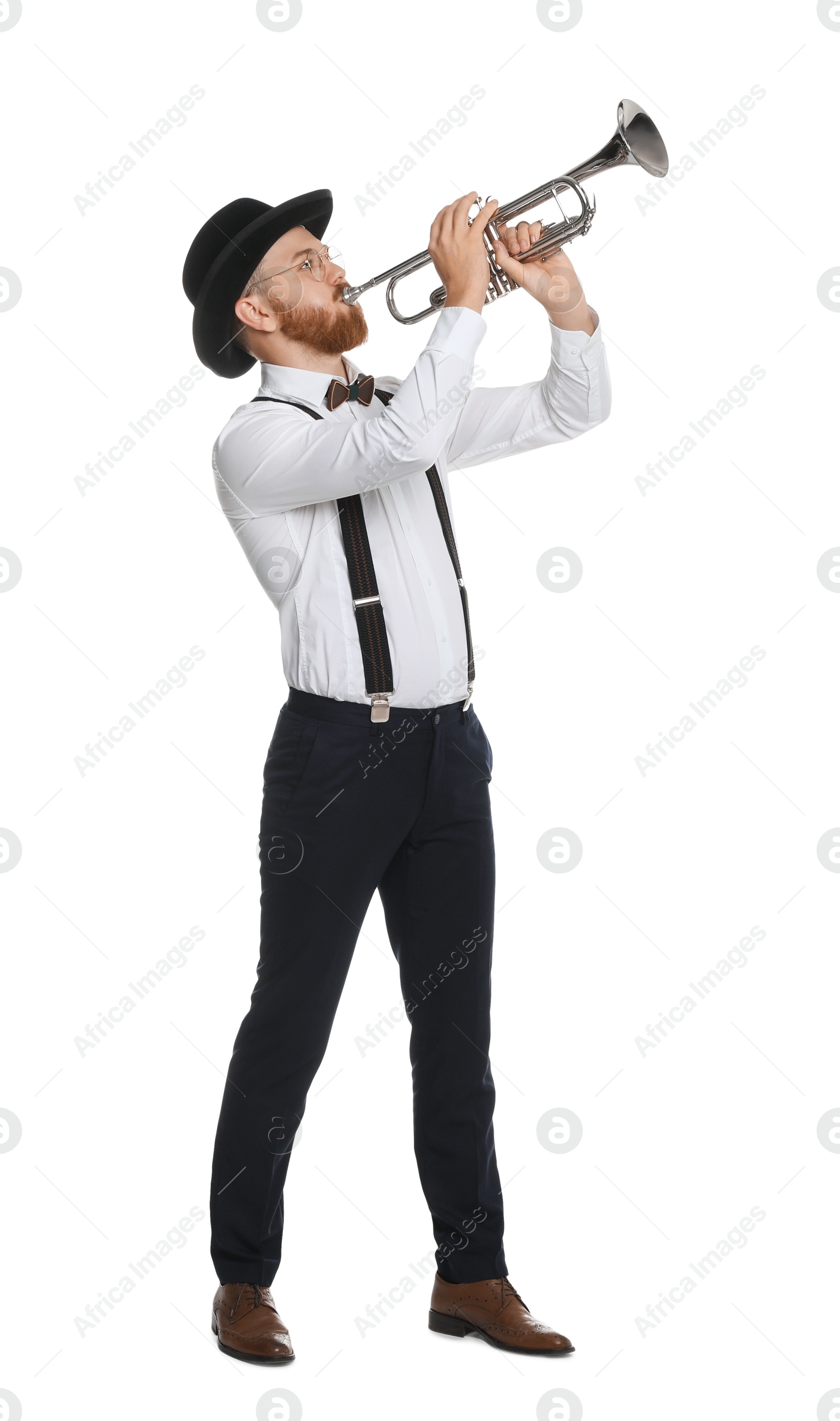 Photo of Handsome musician playing trumpet on white background