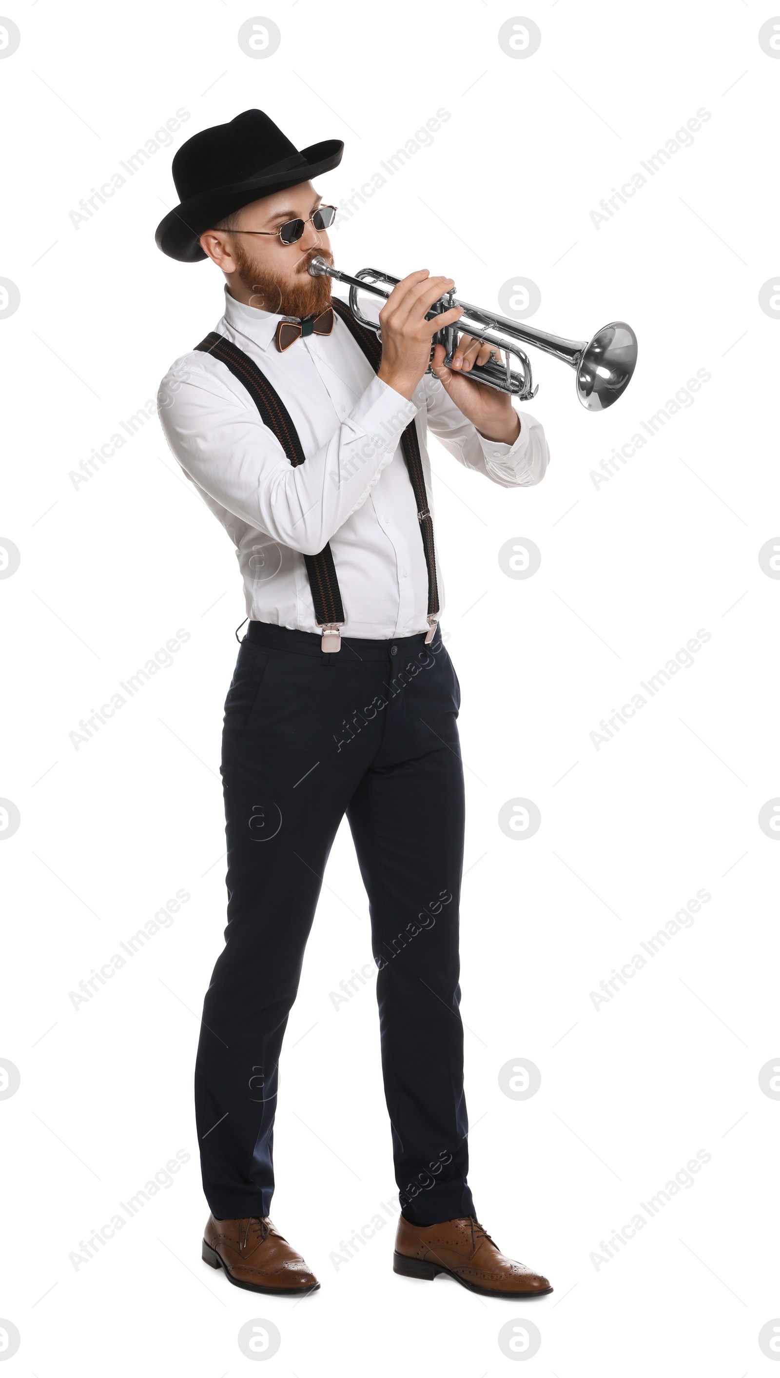 Photo of Handsome musician playing trumpet on white background