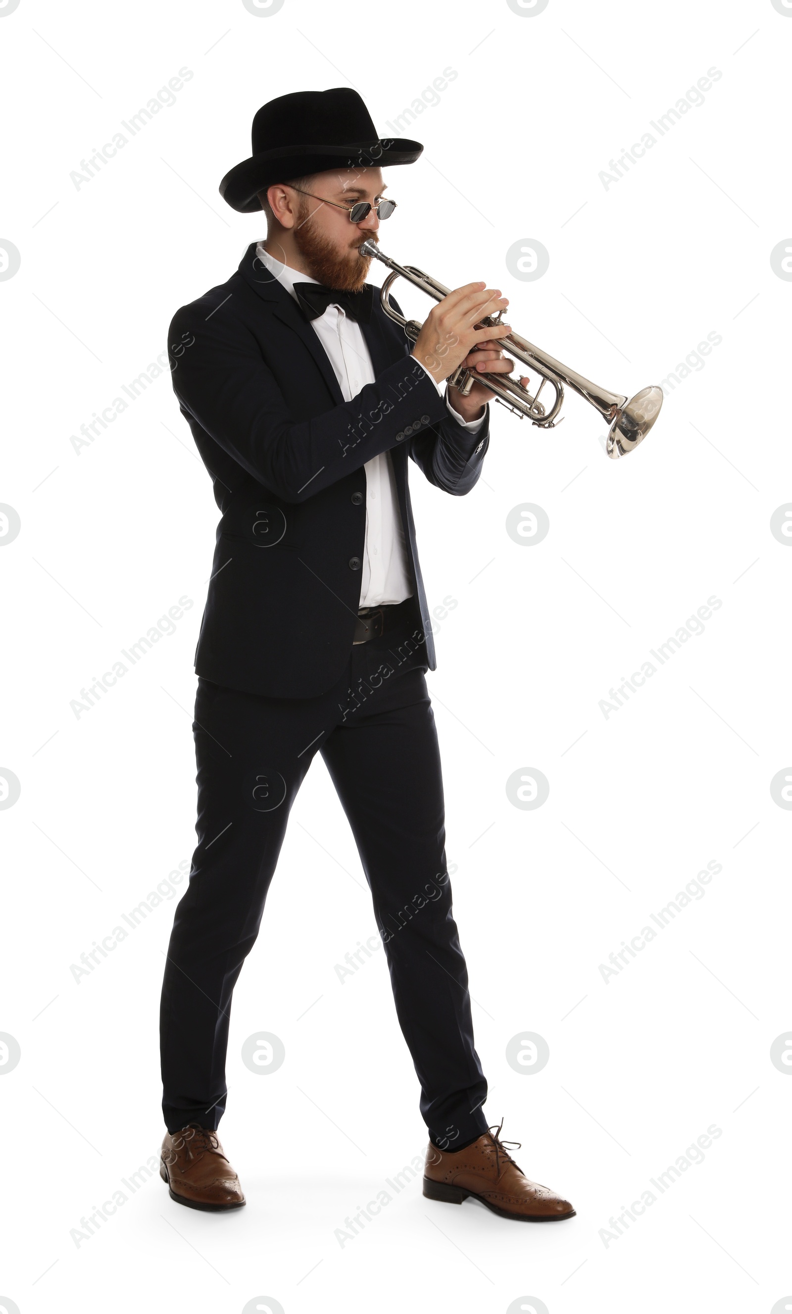 Photo of Handsome musician playing trumpet on white background