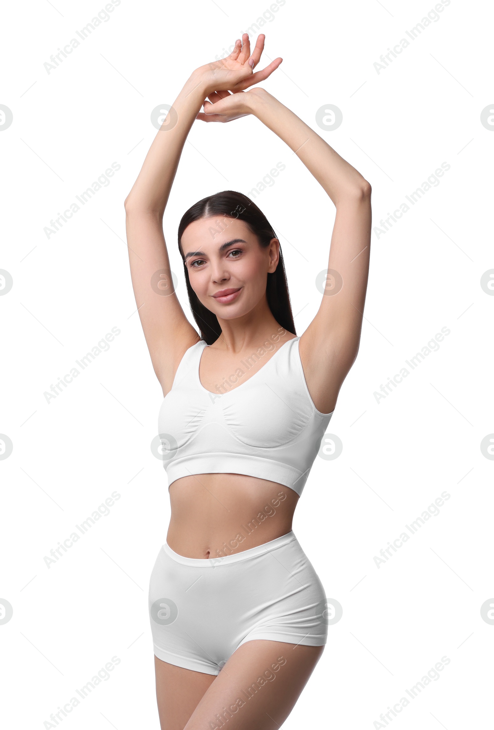 Photo of Diet and weight loss concept. Beautiful young woman with slim body against white background