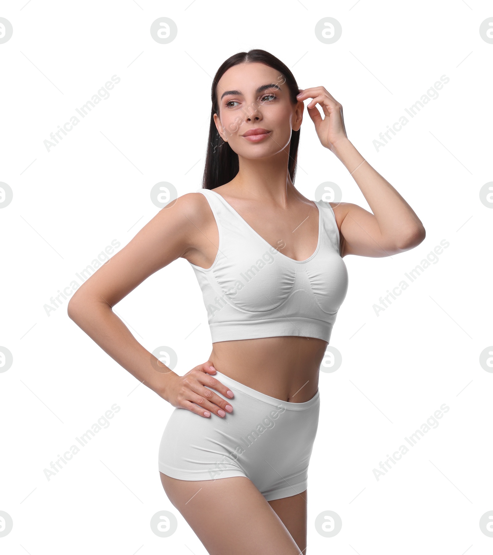 Photo of Diet and weight loss concept. Beautiful young woman with slim body against white background