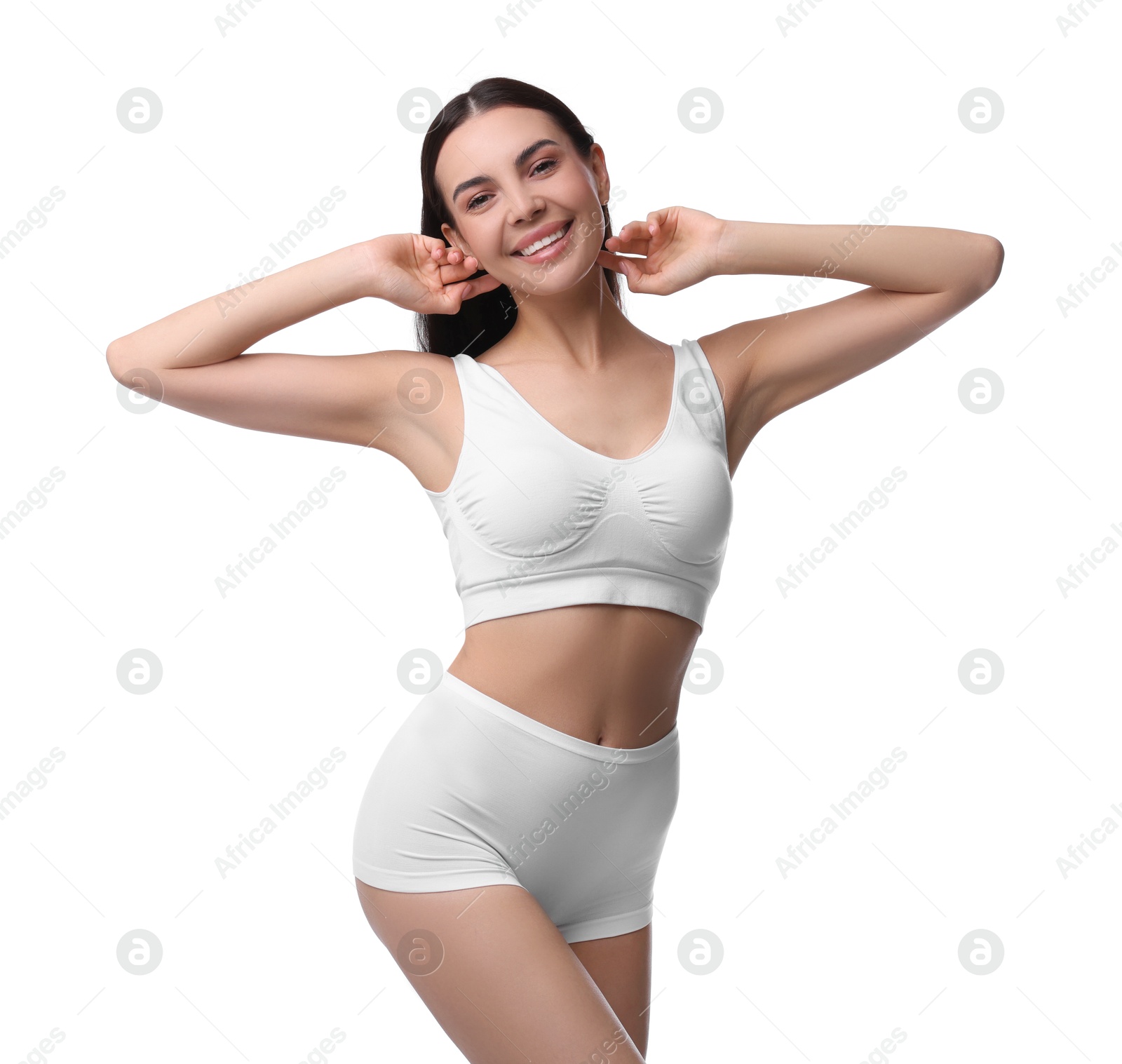 Photo of Diet and weight loss concept. Beautiful young woman with slim body against white background