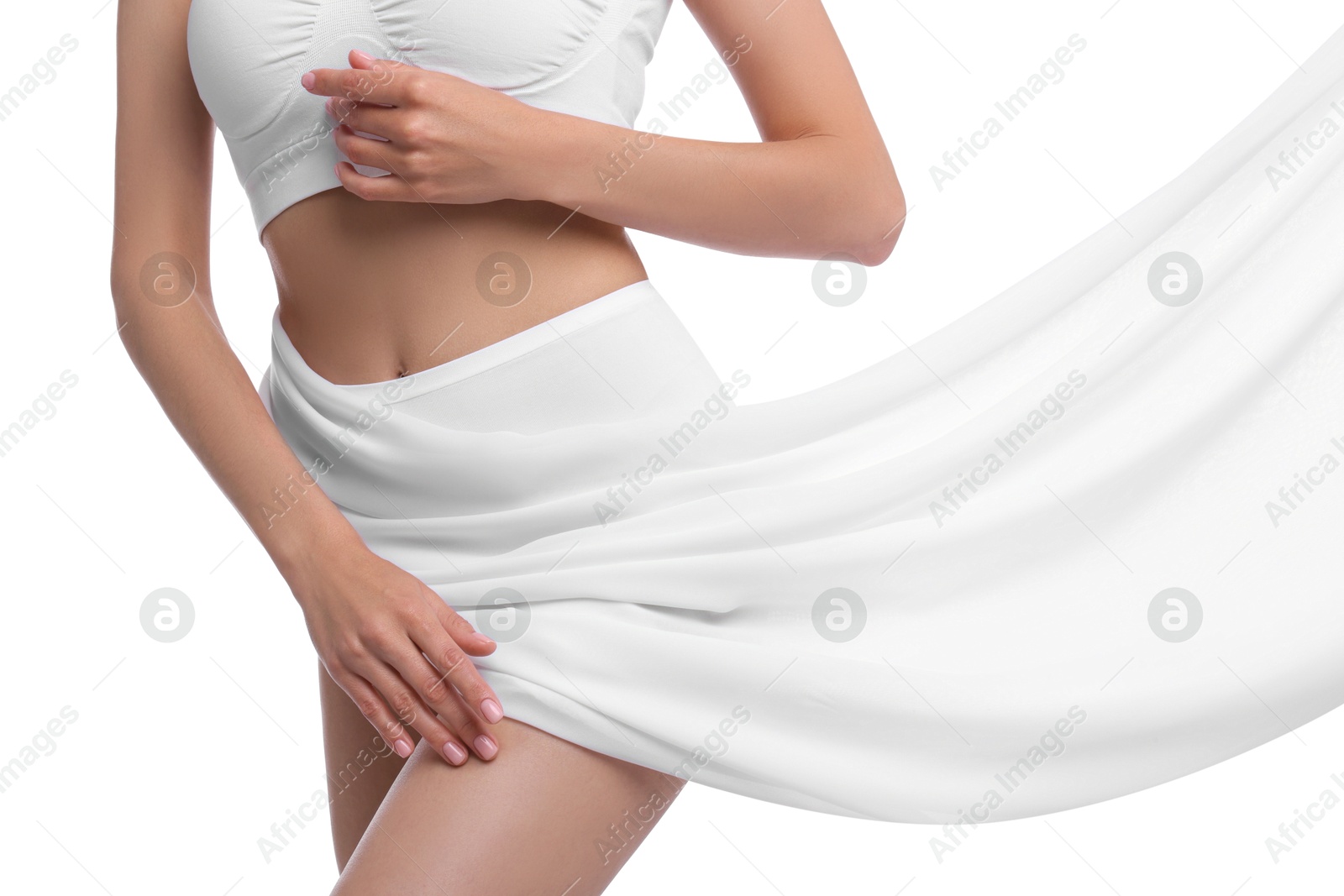 Photo of Diet and weight loss concept. Woman covering her slim body with silk fabric against white background, closeup