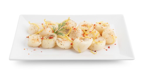 Photo of Raw scallops with spices, dill and lemon zest isolated on white
