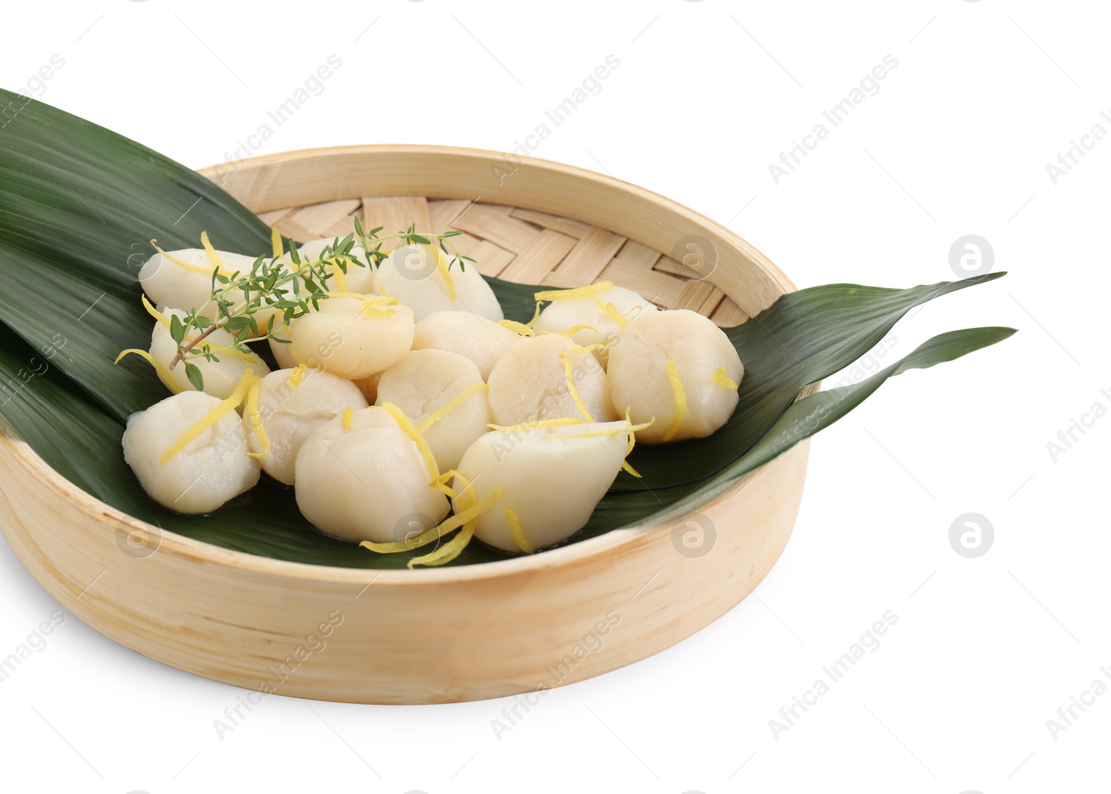 Photo of Raw scallops with thyme and lemon zest isolated on white