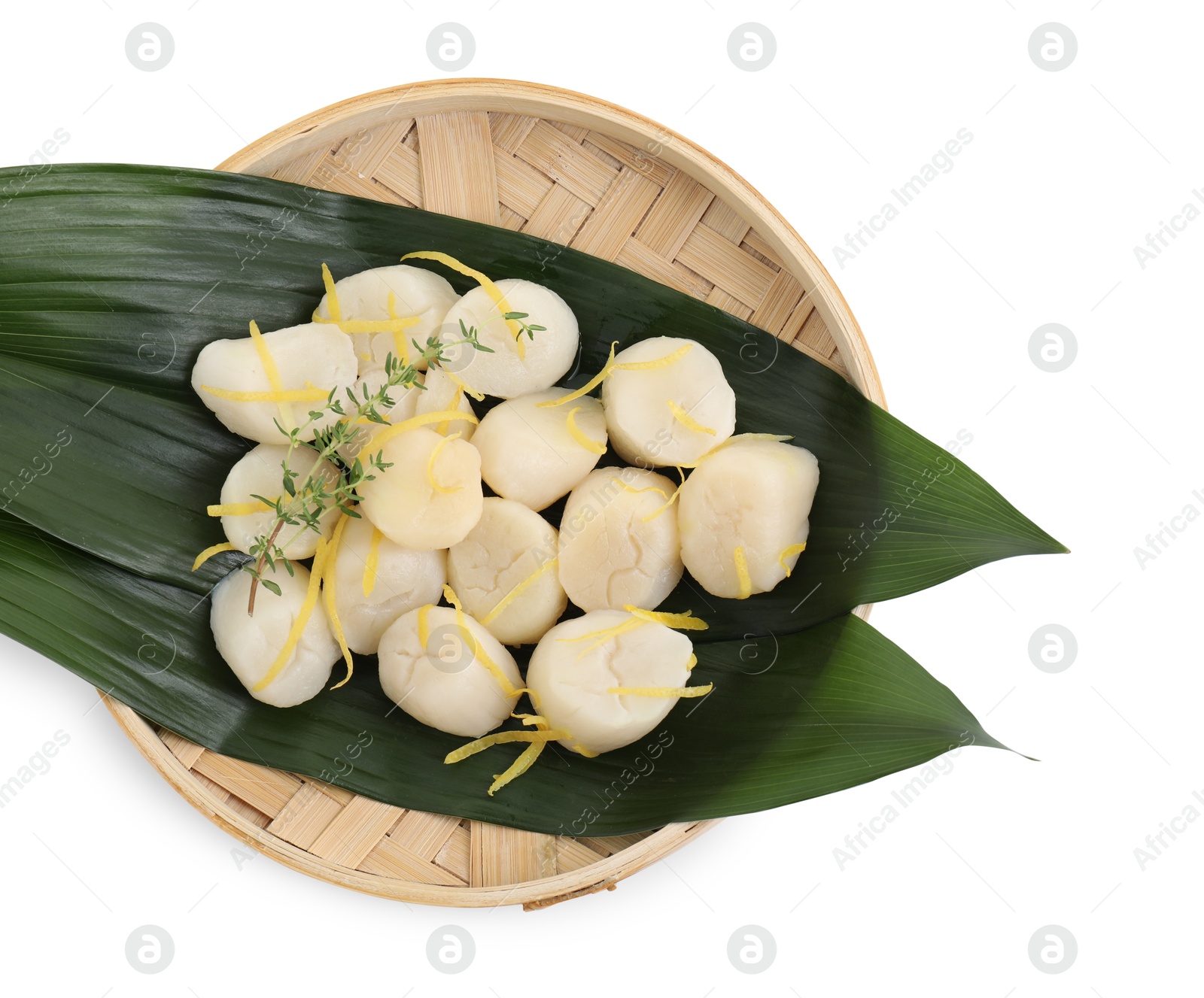 Photo of Raw scallops with thyme and lemon zest isolated on white, top view