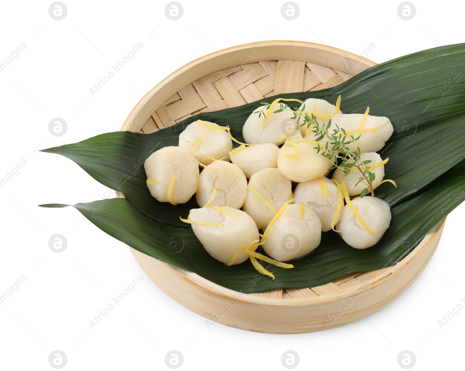 Photo of Raw scallops with thyme and lemon zest isolated on white