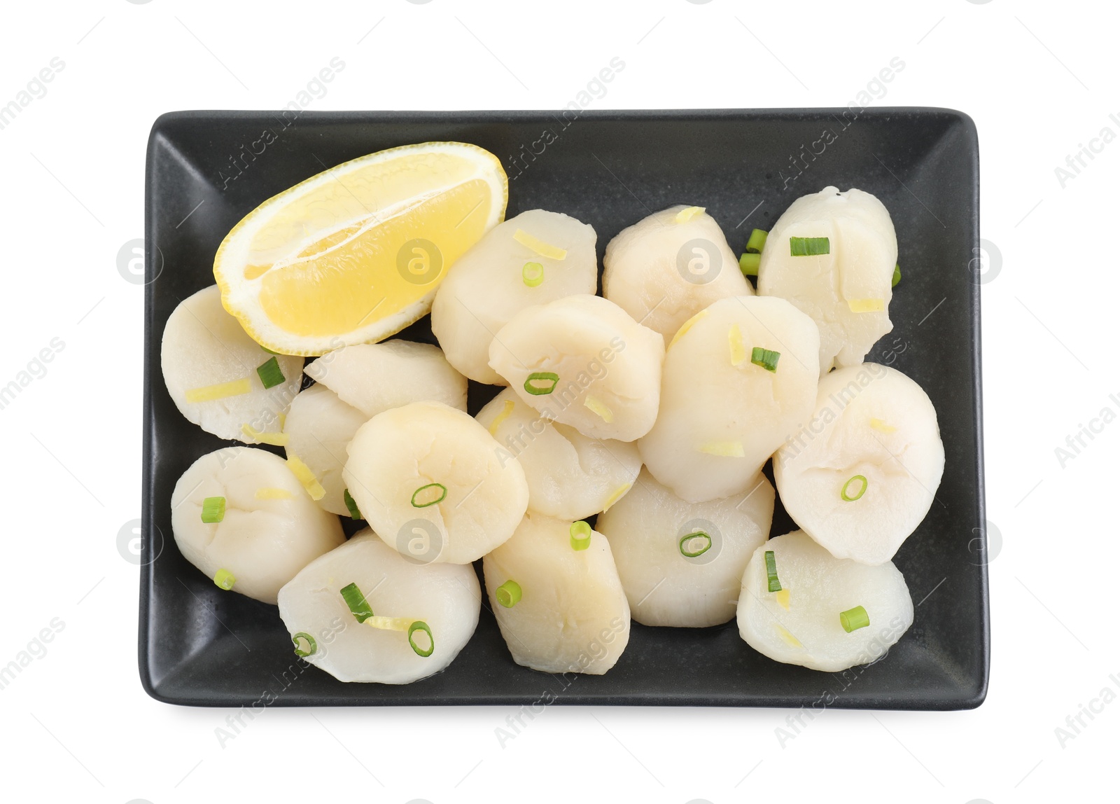 Photo of Raw scallops with green onion and lemon isolated on white, top view