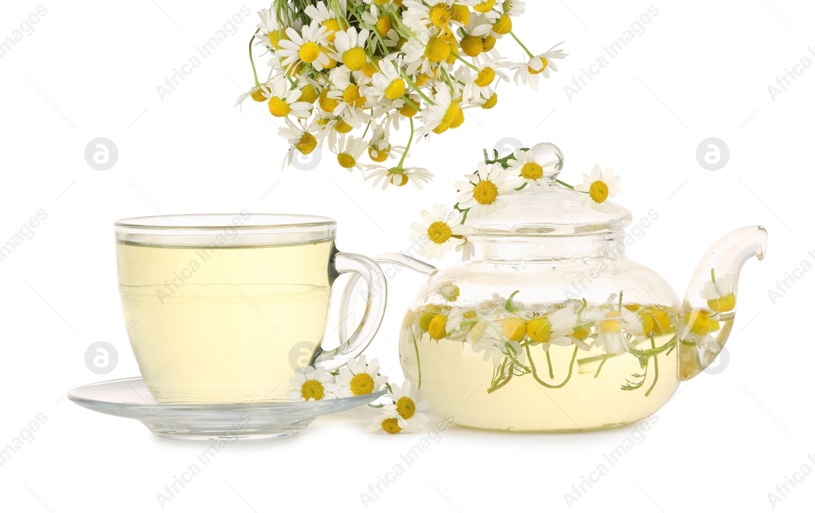 Photo of Aromatic herbal tea with chamomile flowers isolated on white