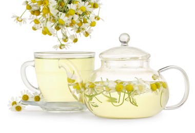 Photo of Aromatic herbal tea with chamomile flowers isolated on white