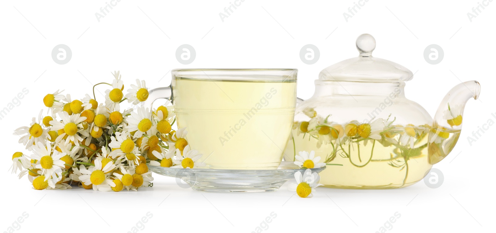 Photo of Aromatic herbal tea with chamomile flowers isolated on white