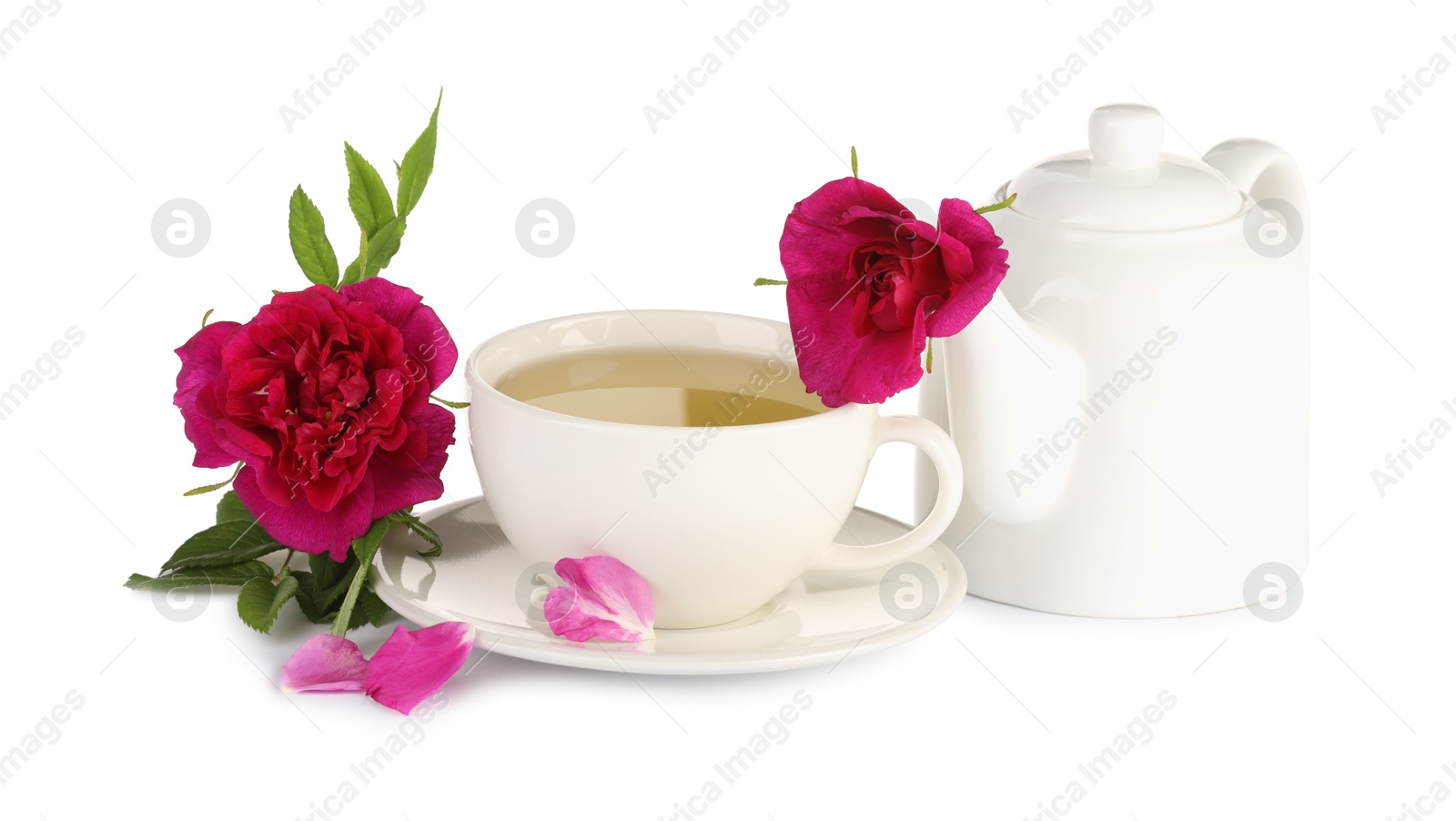 Photo of Aromatic herbal tea with rose flowers isolated on white