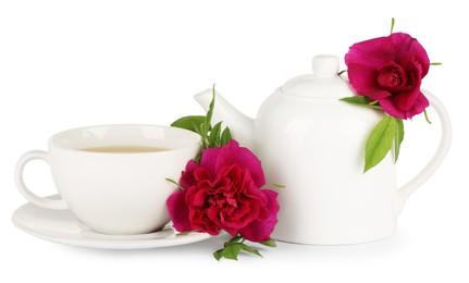 Photo of Aromatic herbal tea with rose flowers isolated on white