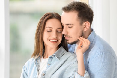 Lovely couple enjoying each other at home