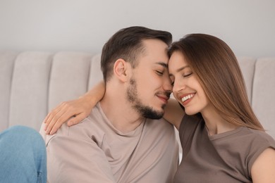 Photo of Lovely couple enjoying each other at home