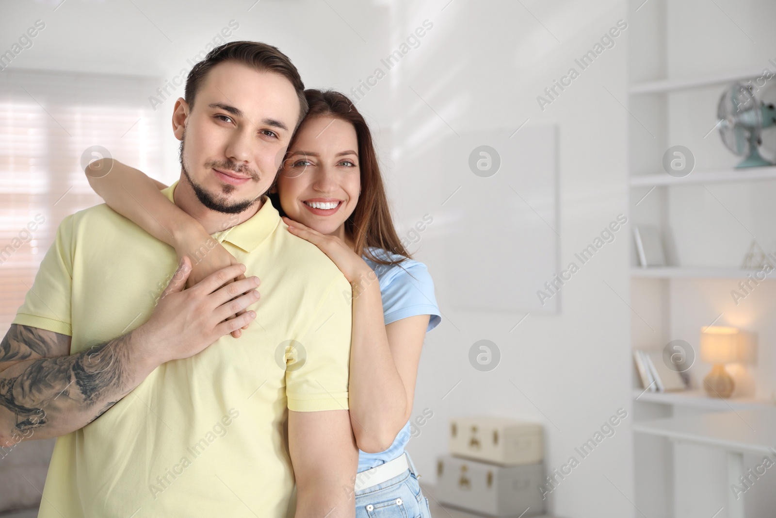 Photo of Family portrait of lovely couple at home. Space for text
