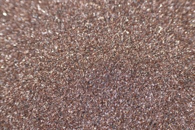 Texture of coarse sandpaper as background, closeup