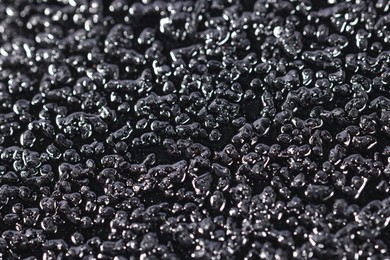 Photo of Texture of coarse sandpaper as background, closeup