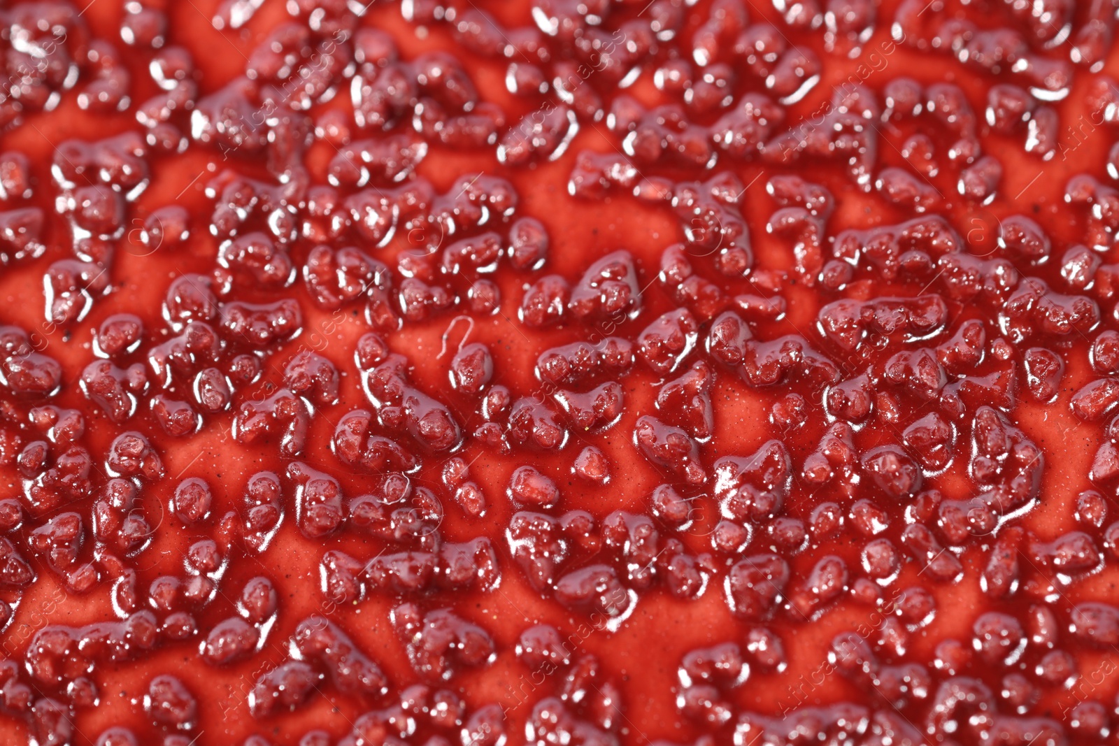 Photo of Texture of coarse sandpaper as background, closeup