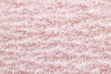 Texture of coarse sandpaper as background, closeup