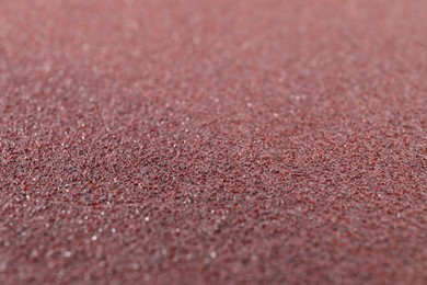 Texture of coarse sandpaper as background, closeup