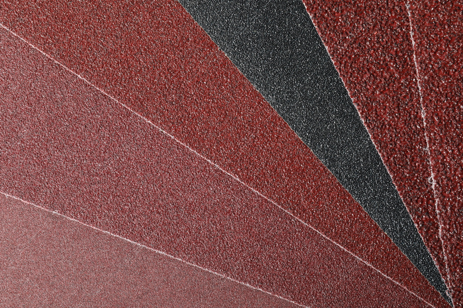 Photo of Many sheets of sandpaper as background, top view