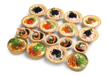 Photo of Delicious canapes with shrimps, salmon and caviar isolated on white