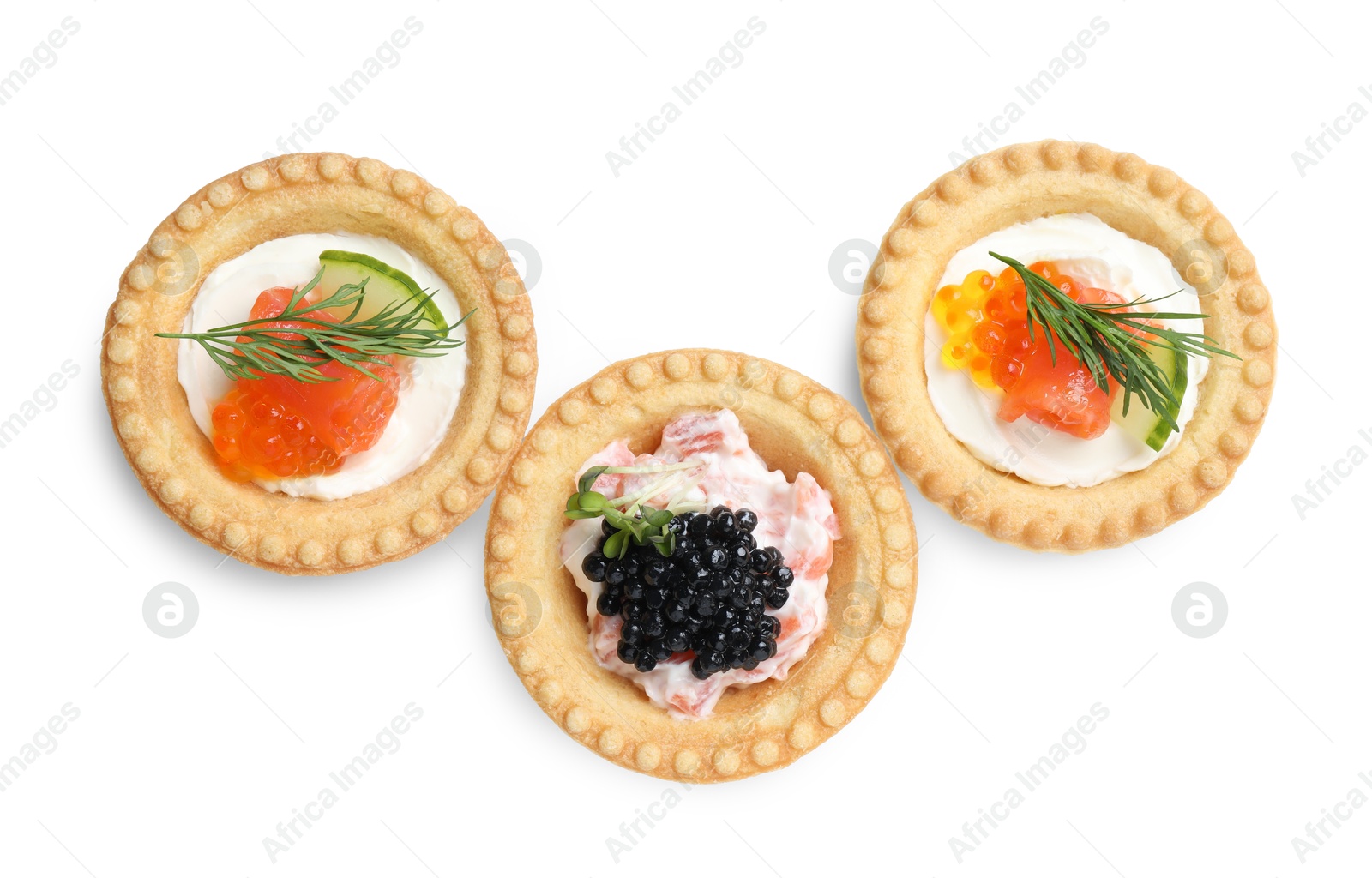 Photo of Delicious canapes with salmon and caviar isolated on white, top view