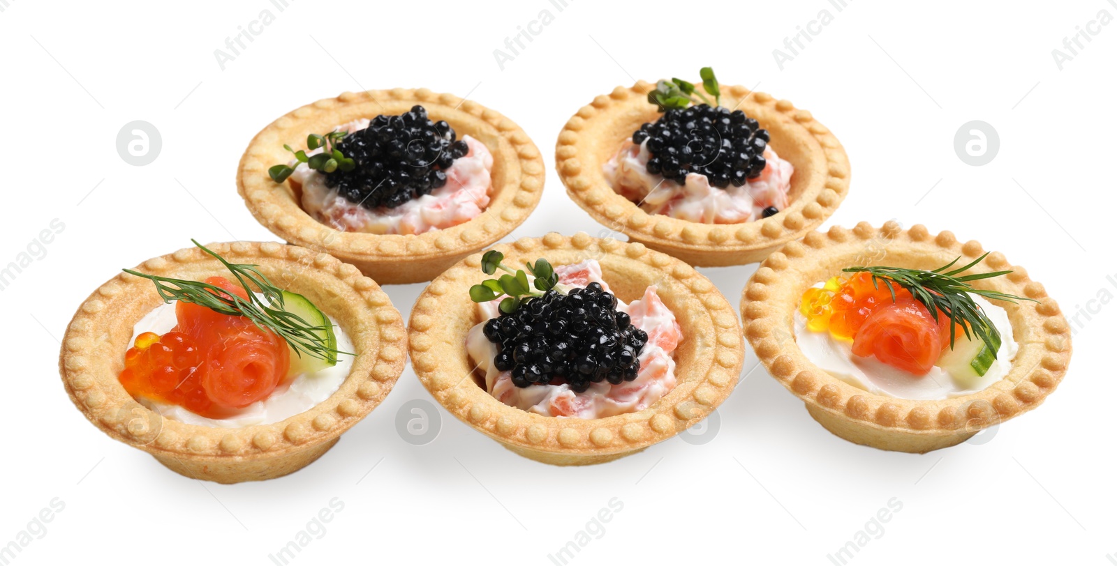 Photo of Delicious canapes with salmon and caviar isolated on white