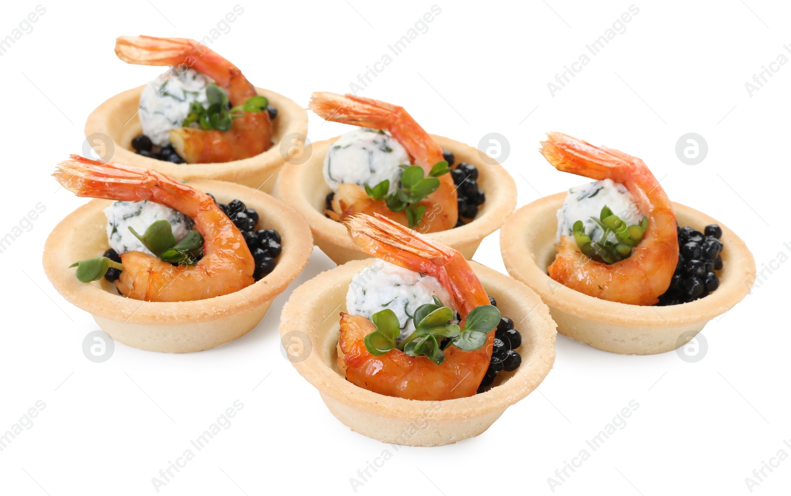 Photo of Delicious canapes with shrimps and black caviar isolated on white