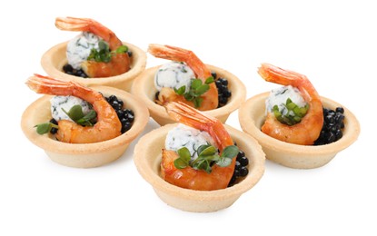 Delicious canapes with shrimps and black caviar isolated on white