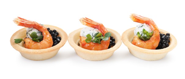 Delicious canapes with shrimps and black caviar isolated on white