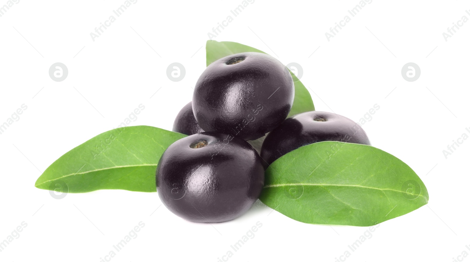 Photo of Fresh ripe acai berries and green leaves isolated on white