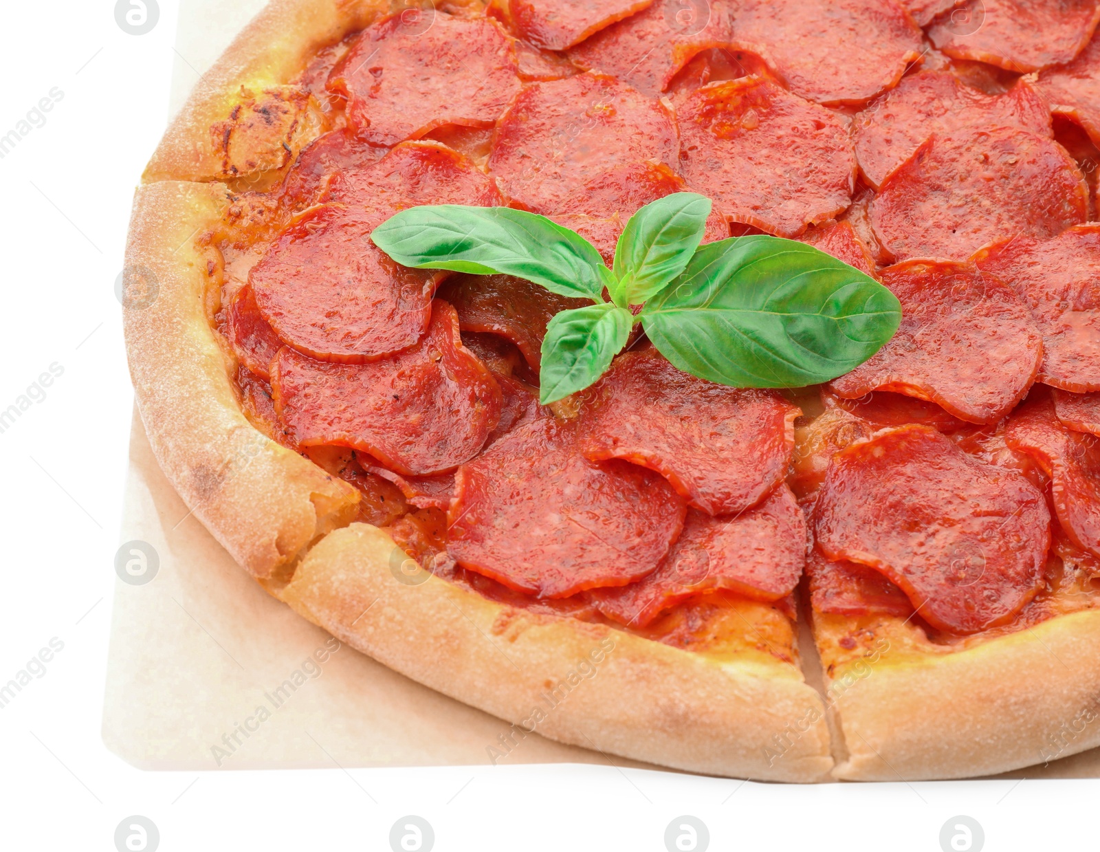 Photo of Tasty pepperoni pizza with basil isolated on white