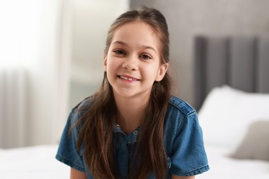 Photo of Portrait of happy little girl indoors. Cute child