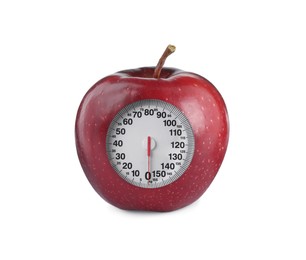 Red apple with analog weighing scale display isolated on white