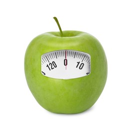 Image of Green apple with analog weighing scale display isolated on white