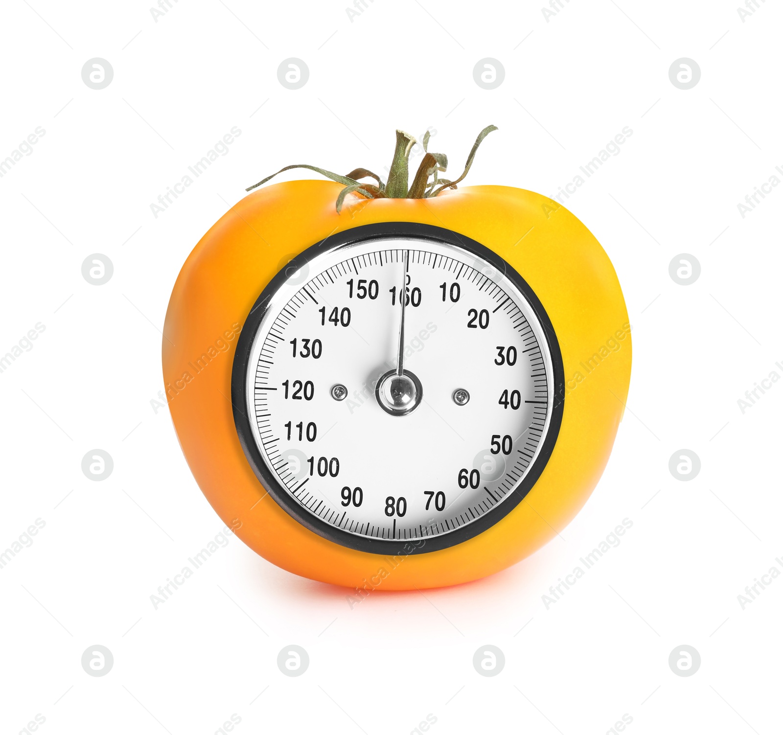 Image of Yellow tomato with analog weighing scale display isolated on white