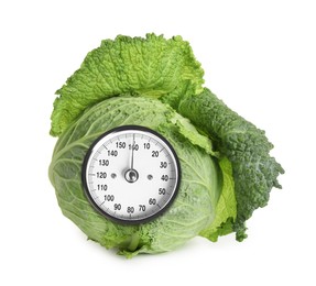 Image of Cabbage with analog weighing scale display isolated on white