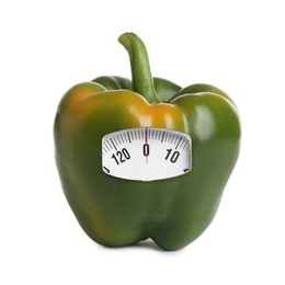 Image of Green bell pepper with analog weighing scale display isolated on white