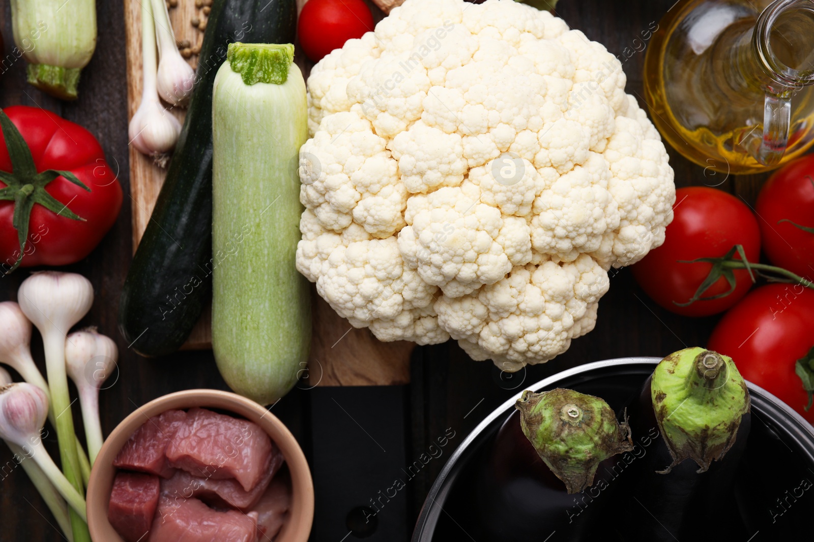 Photo of Different ingredients for stew on table, top view