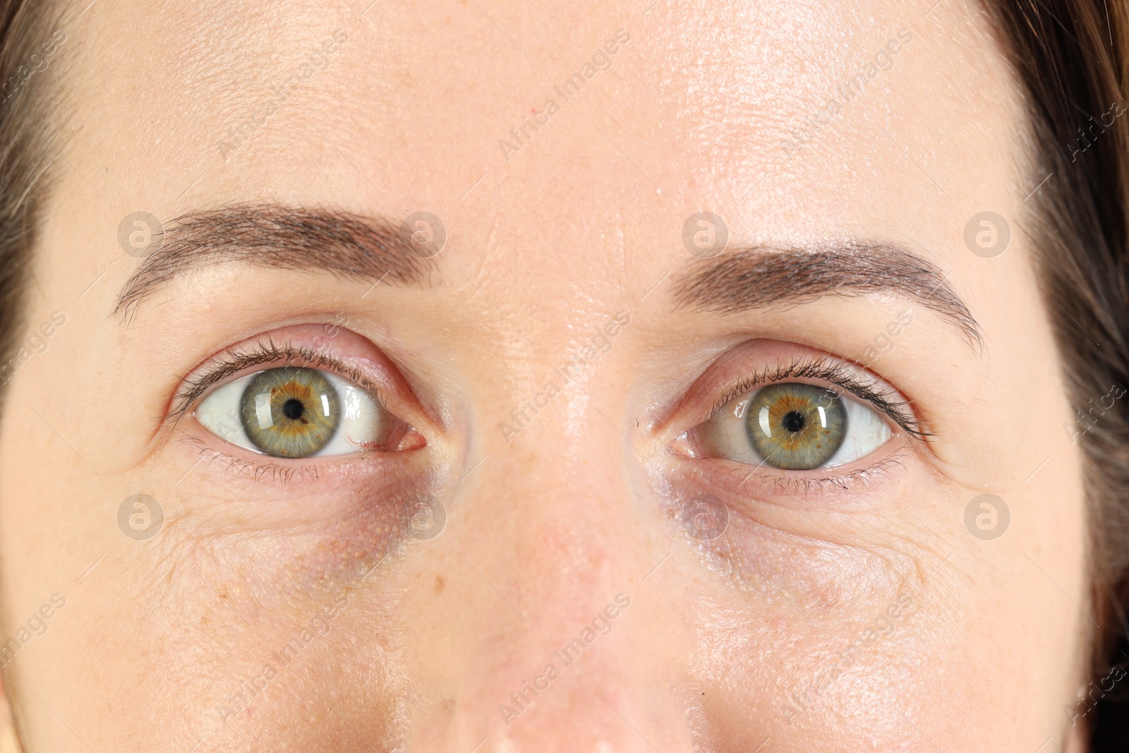 Photo of Woman with beautiful green eyes, closeup view