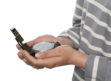 Photo of Woman holding compass on white background, closeup