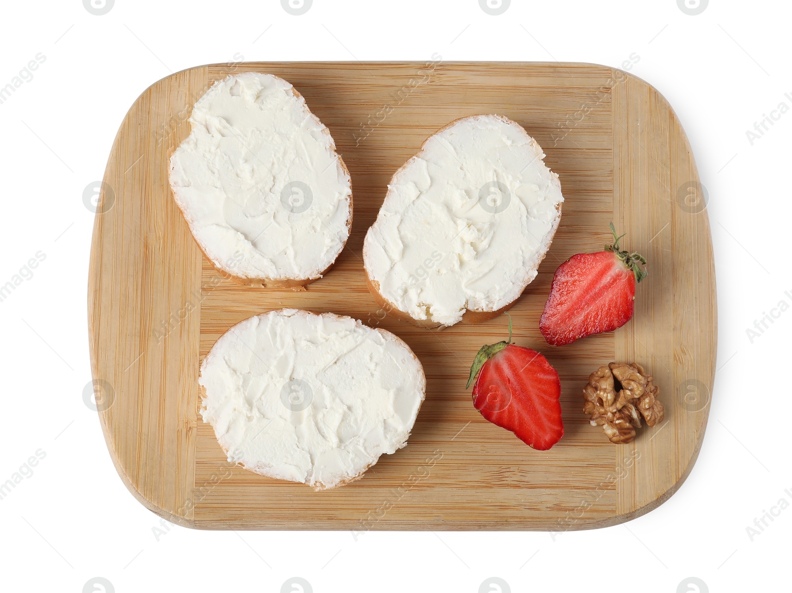 Photo of Delicious bruschettas with ricotta cheese, strawberry and walnut isolated on white, top view