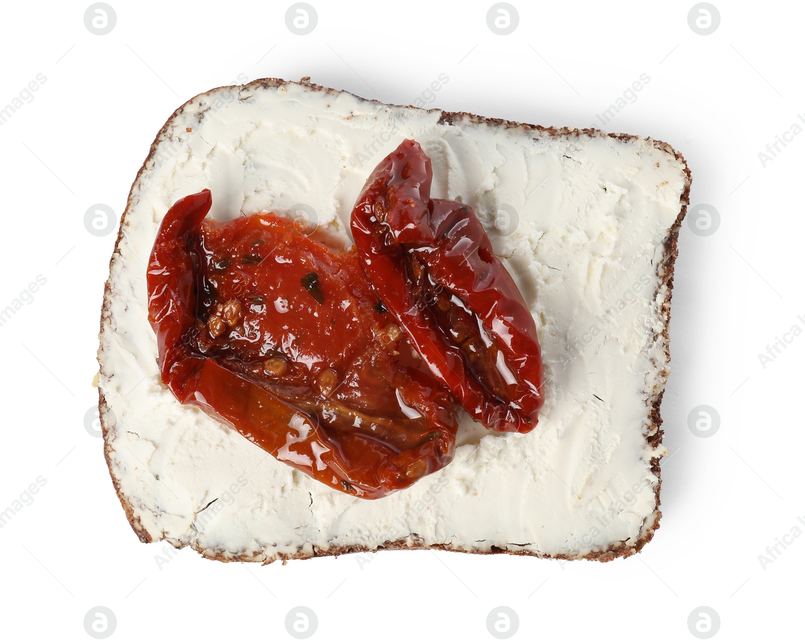 Photo of Delicious bruschetta with ricotta cheese and sun dried tomatoes isolated on white, top view