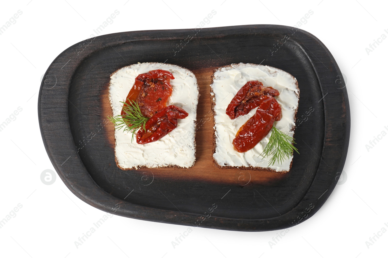Photo of Delicious bruschettas with ricotta cheese, sun dried tomatoes and dill isolated on white, top view