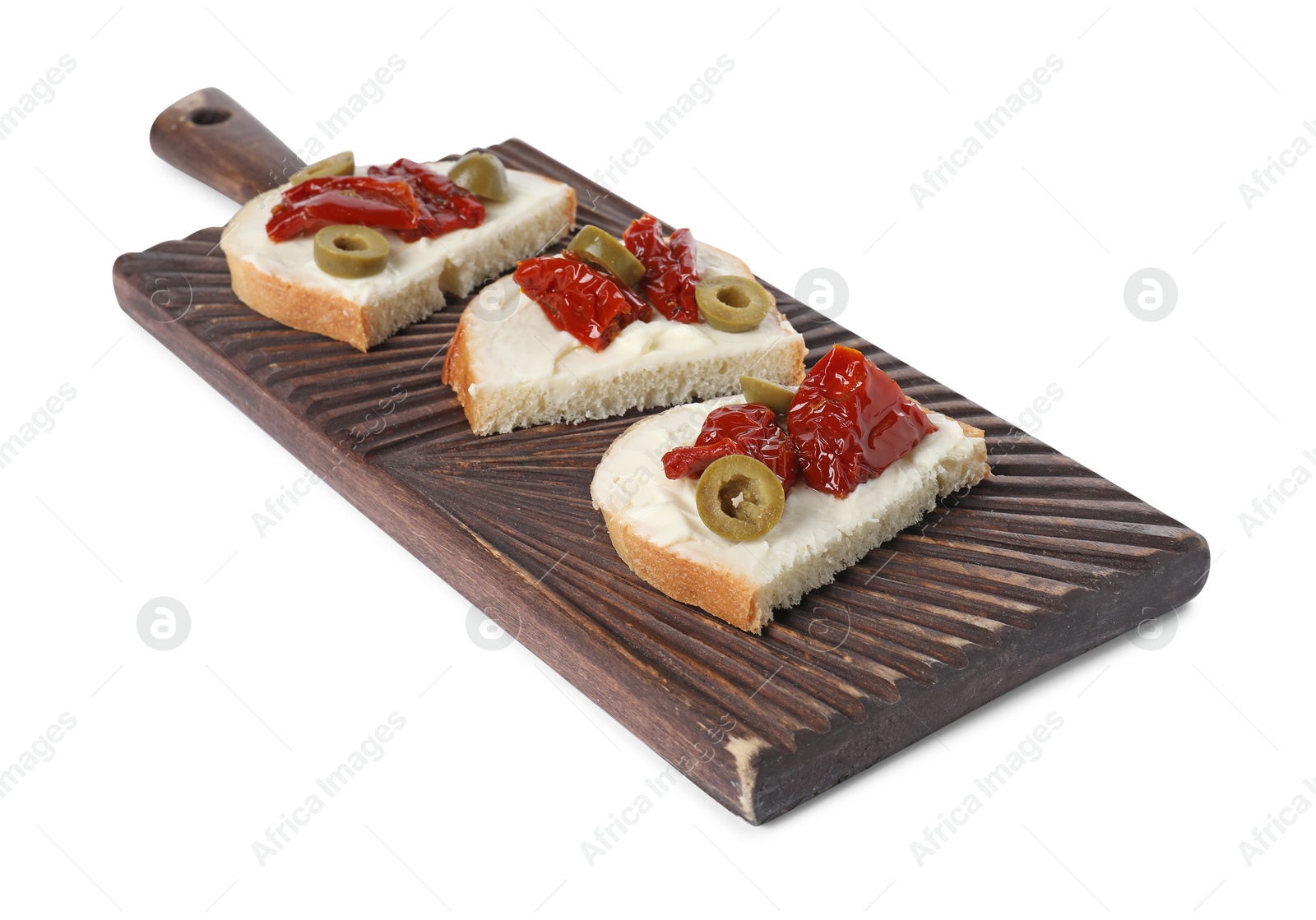 Photo of Delicious bruschettas with ricotta cheese, sun dried tomatoes and olives isolated on white